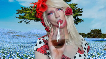Pic of Beautiful Transgender Girl Modeling Red Roses