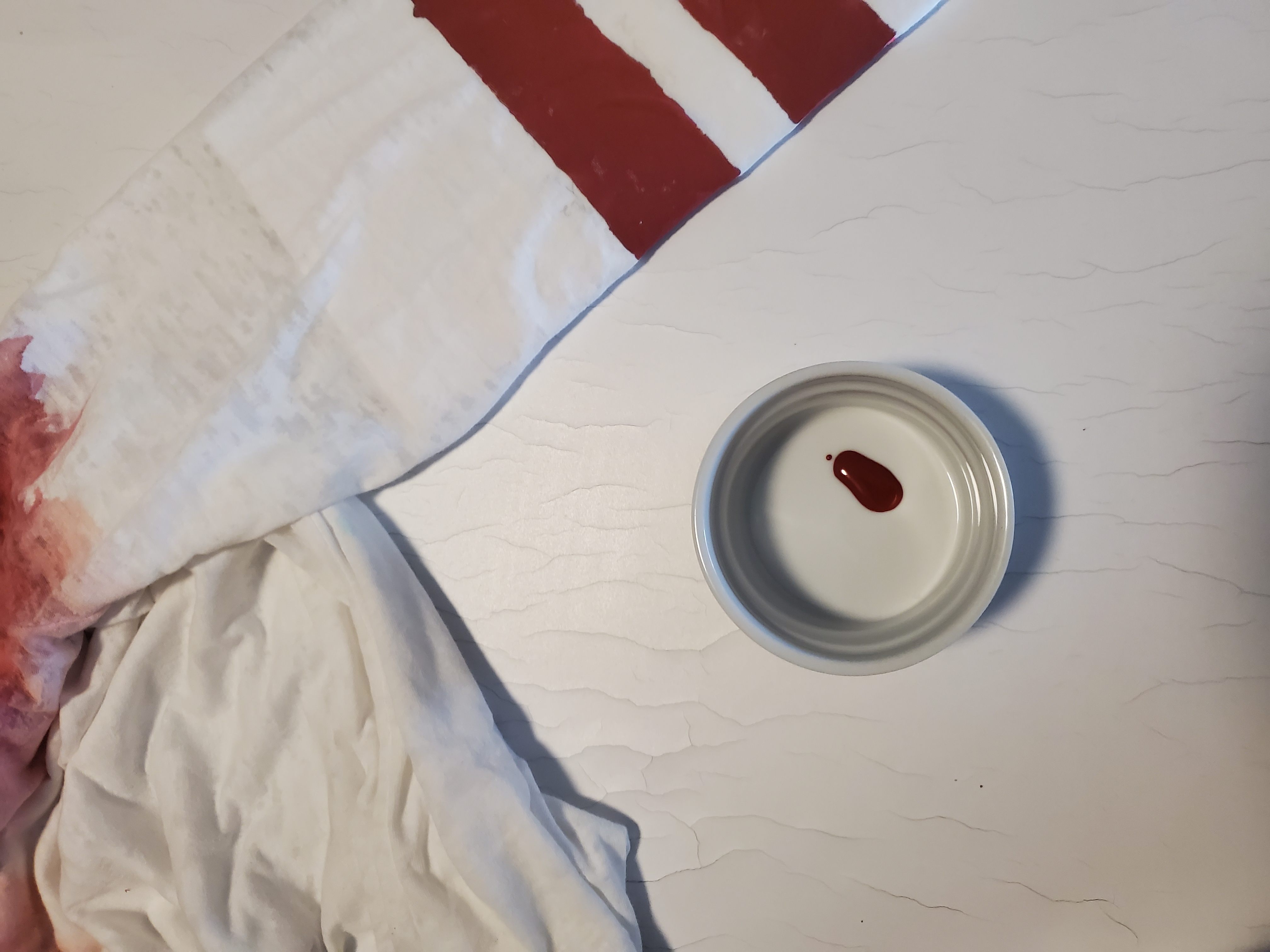 Small dab of red to create smudge.