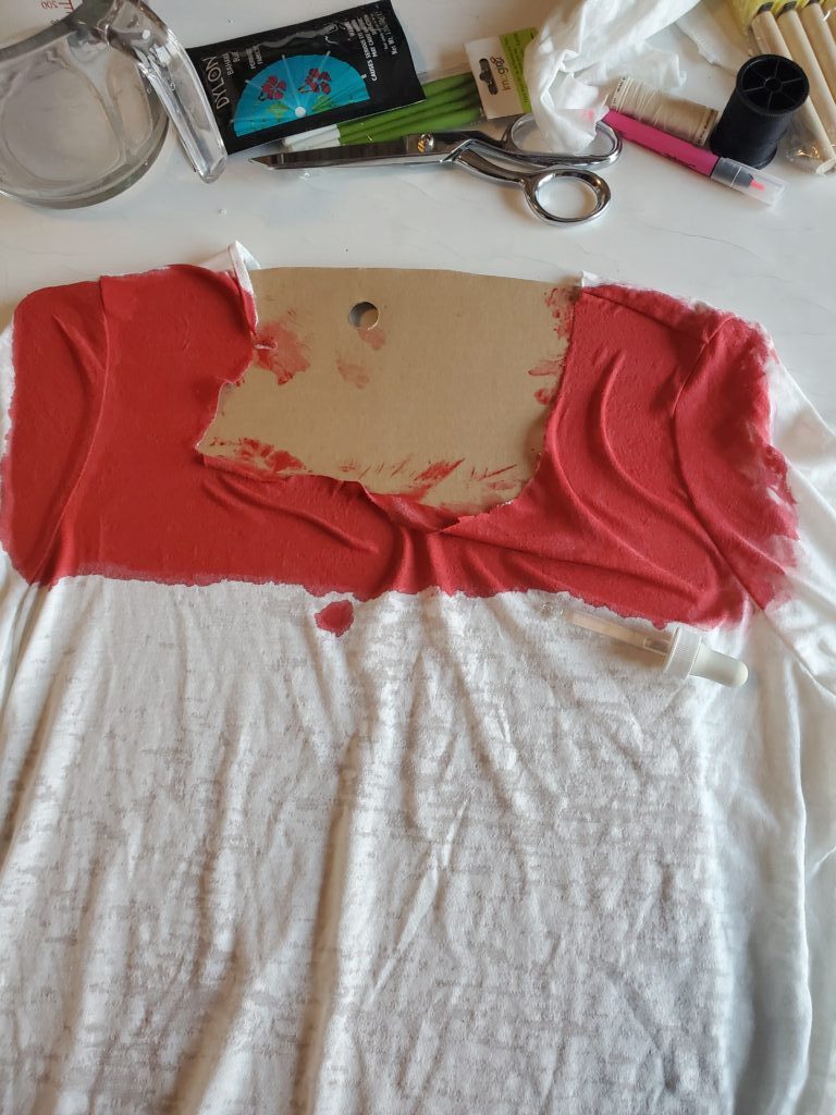 T-Shirt after cutting and first crimson paint application